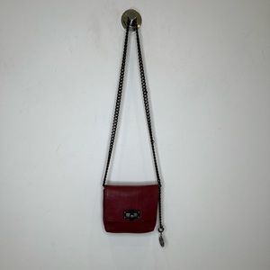 Lanvin burgundy leather purse with heavy cross body chain.